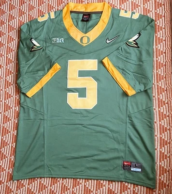 Jersey verde Oregon Ducks #5 Dante Moore talla: grande Foto 1 de 4