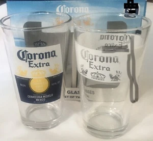2 Corona Beer Pint Bar Beer Glasses New in Box - Each A Different Design - Picture 1 of 15