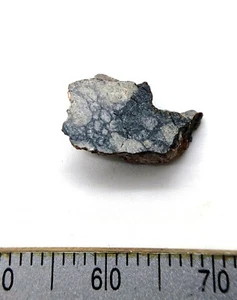 Rebanada de meteorito NWA 2988 - 0,72 gramos - Eucrite - Imagen 1 de 3