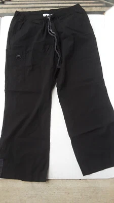 Pantalón exfoliante negro melocotones con bolsillos a presión talla LP Foto 1 de 2