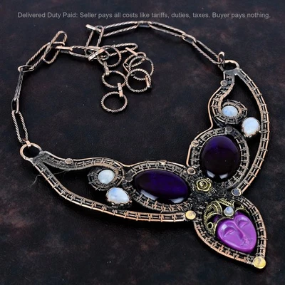 Oferta de Navidad Cobre Pera Púrpura Cara Tallada Piedra Cadena Alambre Envuelto Collar Foto 1 de 4