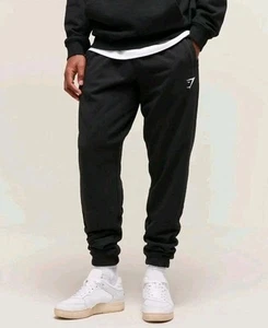 Felpa GymShark Crest Joggers nera vestibilità affusolata A1A2A uomo taglia XS - Foto 1 di 9
