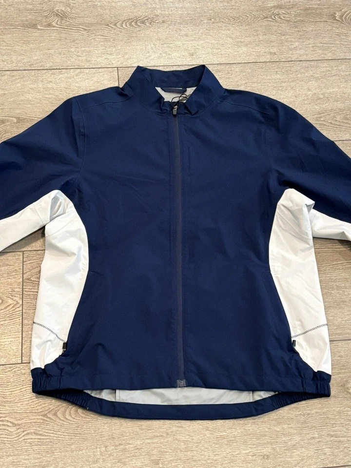 Chaqueta de lluvia Sun Mountain Monsoon XL para mujer Chaqueta de golf azul marino blanco nueva con etiquetas Foto 1 de 4