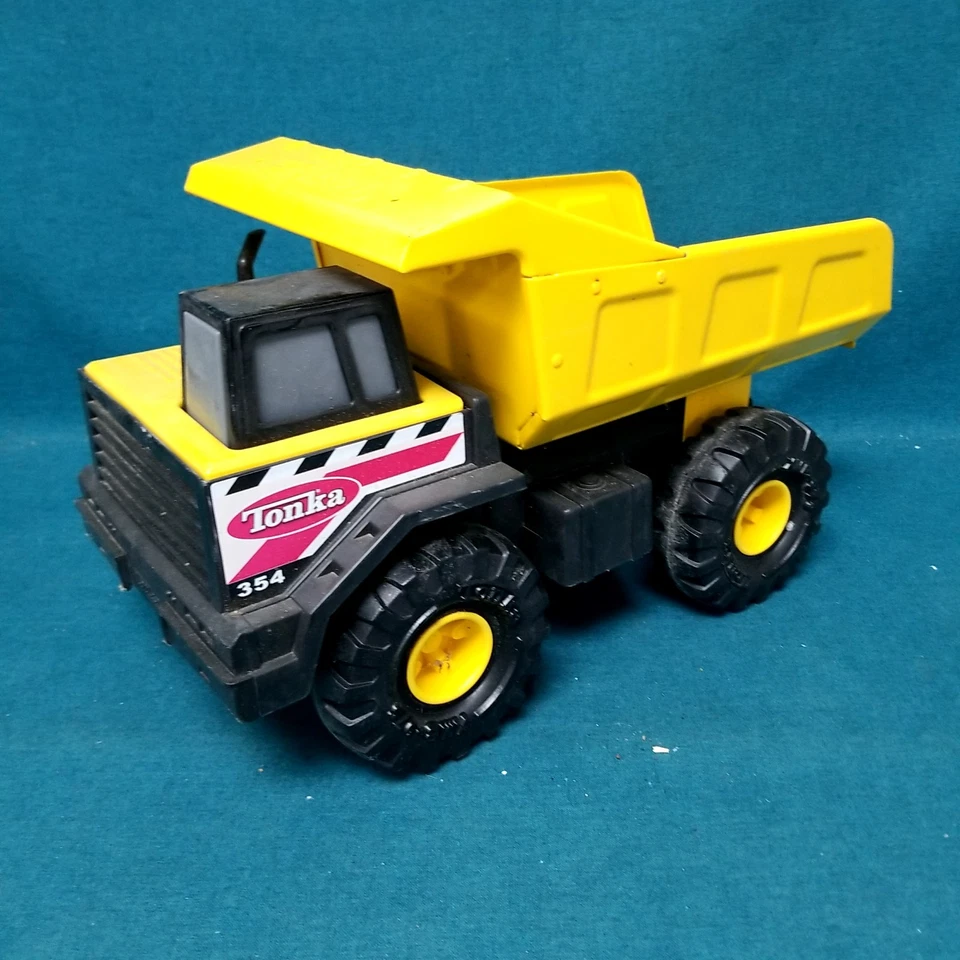 Camión de volteo Hasbro Tonka 354 2012 metal/plástico amarillo poderoso juguete Foto 1 de 4