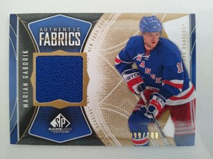 2009-10 Sp Game Used Marian Gaborik Gold Authentic Fabrics #/100