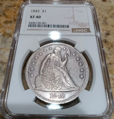 1842 Liberty Seated dollar, NGC XF40; old silver with dark tones at features - Image 1 of 4