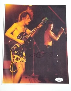 Angus Young guitarist of AC/DC REAL SIGNED 8.5x11" Photo JSA COA Autographed - Picture 1 of 3