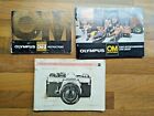 Nice collection of two Olympus Om-2 Manuals and an Olympus Zuiko lens catalogue