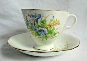 CLARENCE BONE CHINA CUP AND SAUCER YELLOW AND BLUE FLOWERS MADE IN ENGLAND - Picture 1 of 3