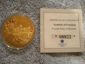 AMERICAN MINT SYMBOLE DER FREIHEIT - FREIHEITSSTATUE GOLDMÜNZE (KRISTALLINLAY) - Bild 1 von 4