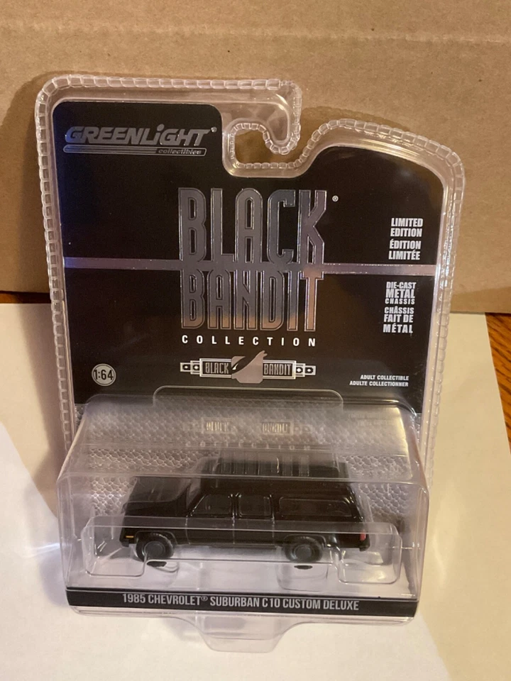 Greenlight Black Bandit 1985 Chevrolet Suburban C10 Custom Deluxe - Image 1 of 1