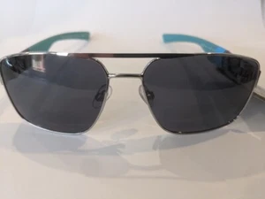Foster Grant Sonnenbrille silberfarben mit schwarz & türkis fortschrittlich Komfort 100 % UVA/UVB - Bild 1 von 8