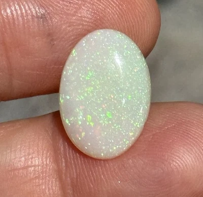 3.55ct 16.8c12x3.4mm Finest Pin Fire Stardust Ethiopian Welo Opal Oval Cabochon - Image 1 of 4