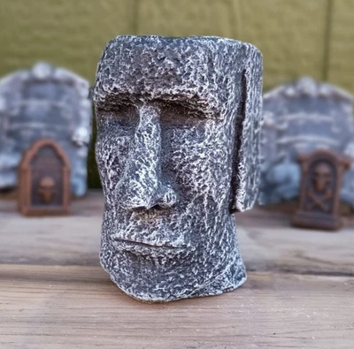 Isla de Pascua concreto Moai cabeza maceta Rapa Nui suculentas plantas flores Foto 1 de 3