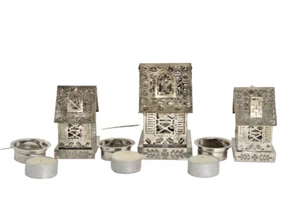 Candele vintage Tealight case traforate metallo latta argento 3 pezzi - Foto 1 di 7