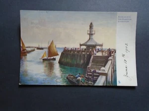 SUFFOLK: PAINTED VIEW OF THE HARBOUR ENTRANCE, LOWESTOFT - PRINTED- POSTED 1903 - Picture 1 of 2