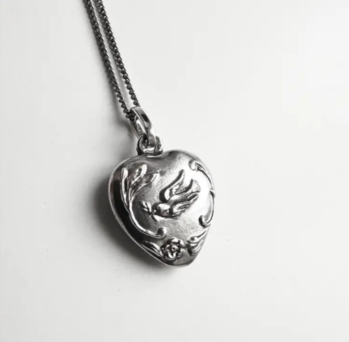 SAINT LAURENT (YSL) Saint Laurent heart shaped necklace with a Dove (YSL)