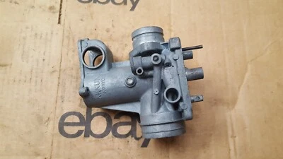 1978 Kawasaki KZ1000 A2 outer right carburetor body # 4 MIKUNI 102 5A - Image 1 of 4