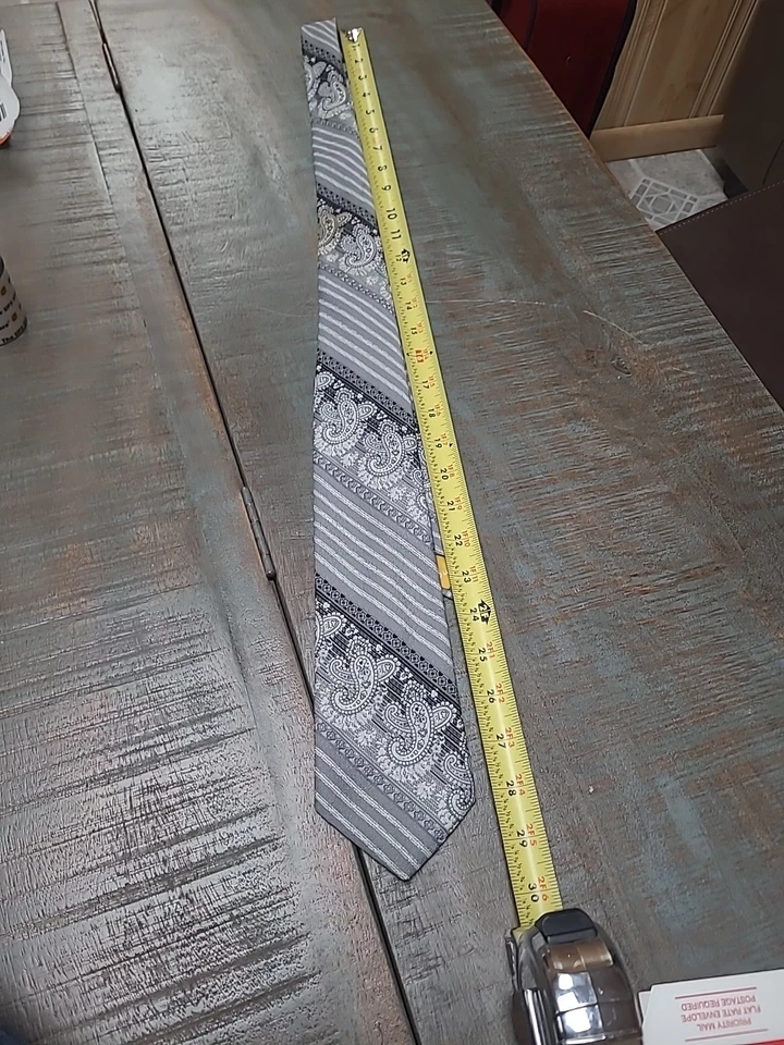 Corbata vintage de poliéster Cravts de Tonino Firenza para hombre.  Tiene un punto en él. Foto 1 de 2