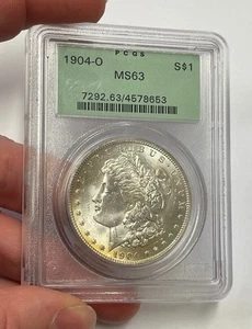 U.S. - 1904-O Silver Morgan Dollar (PCGS MS 63) Older Holder - Picture 1 of 6