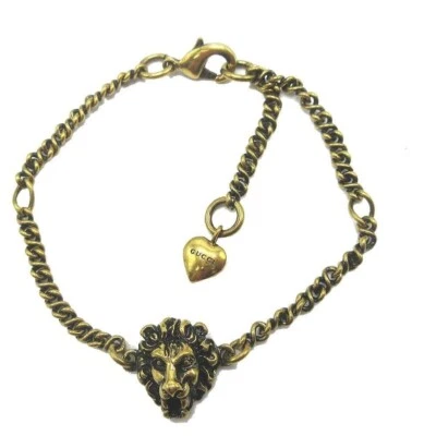 Bracelet chaîne en métal Gucci tête de lion cœur doré - Photo 1/4
