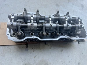PROPERLY REBUILT 80-89 nissan datsun d21 720 OEM z24 complete cylinder head 0MIL - Picture 1 of 7