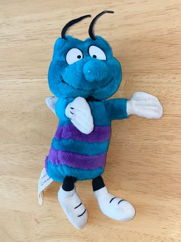 Vintage Charlotte Hornets NBA Plush Teal & Purple 1994 "Hugo the Hornet" Mascot Cover