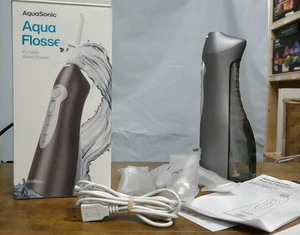 Aquasonic Aqua Flosser - Flosser ad acqua ricaricabile professionale con 4 punte - 3 - Foto 1 di 5