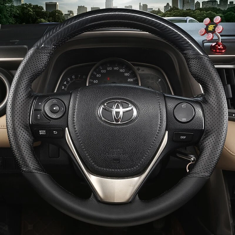 Cubierta de volante de coche de cuero de fibra de carbono cosida a mano para Toyota Corolla Foto 1 de 2