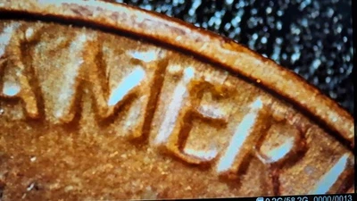 DIE PITS/GOUGES, TRAILING, REPUNCHED MINT MARK, OFF-CENTER PUNCH, 1982D ZINC#533 - Image 1 of 4