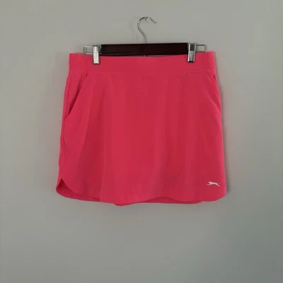Skort de golf Slazenger para mujer rosa medio caliente atlético brillante femenino divertido F5 Foto 1 de 4