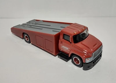 Camión de remolque de plataforma plana Hot Wheels Premium Jones Exotic Real Riders suelto Foto 1 de 3