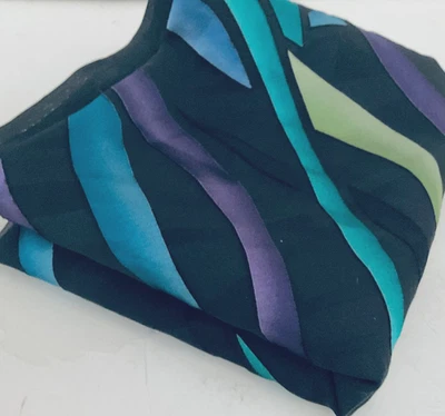 Semi-sheer Chiffon Fabric: 55" x 1.5+ yds Multicolor Waves on Black - Image 1 of 4