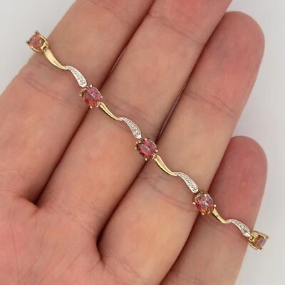 Brazalete de tenis con racimo de diamantes y topacio místico de oro amarillo de 9 quilates con sello de 7,25" Foto 1 de 4