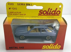 Solido - blau/schwarz Ford Sierra XR4I - Maßstab 1:43 #1340 - Bild 1 von 2