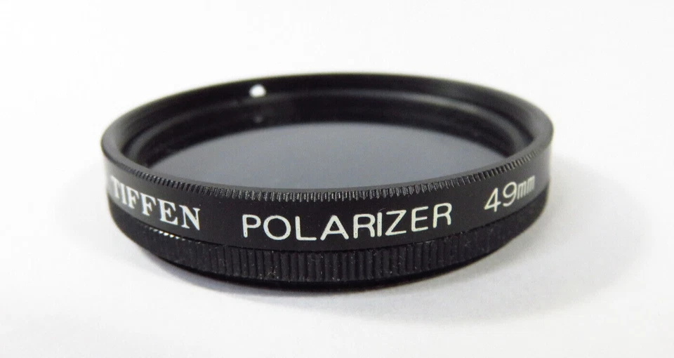 Tiffen 49mm screw in Polarizer Filter / #217 - Image 1 of 1