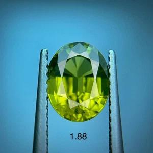 1.88 ct BEAUTIFUL GREEN Natural PERIDOT GEMSTONE OVAL CUT GFCO CERTIFIED CHINA - Picture 1 of 2