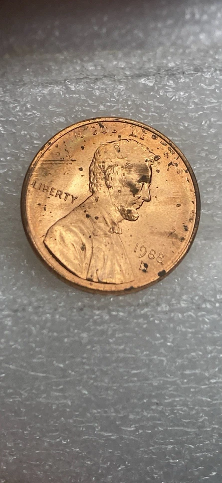 1988-D Mint Penny Struck Through Error Obverse. On The Face And Above Liberty - Image 1 of 4