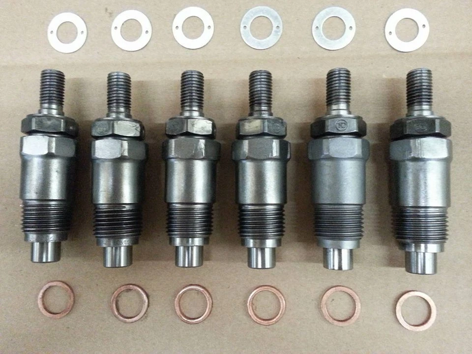 Juego de 6 inyectores de combustible Kubota M4000 usados/reconstruidos servicio de reconstrucción Foto 1 de 1