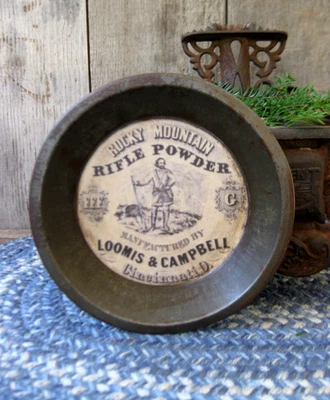 Antique 6" Tin Toy Pie Pan Old Advertisement Print Rocky Mountain Rifle Powder - Image 1 of 4