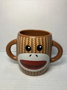 SOCK MONKEY DOUBLE HANDLED 16 OZ COFFEE MUG 4" GALARIE - Picture 1 of 6
