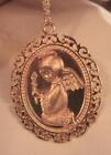 Lovey Swirl Rim Sculpted Angel with Candle Goldtone Pendant Necklace Christmas