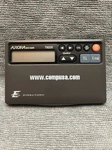 Banque de données Aurora TM200 organisateur, calculatrice et horloge d'annuaire de téléphone - Photo 1 sur 4