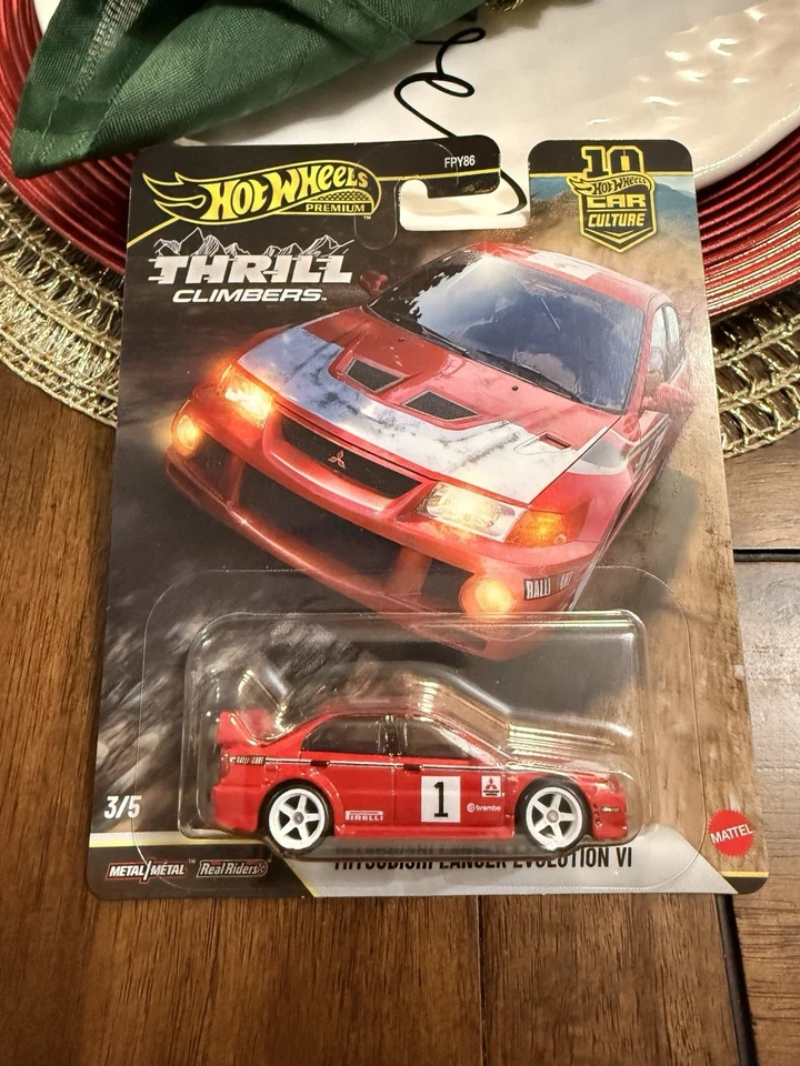 Escaladores de emoción Hot Wheels Car Culture Mitsubishi Lancer Evolution VI - En mano Foto 1 de 1