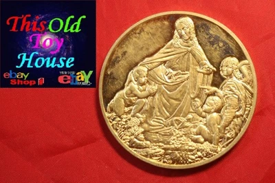 STERLING SILVER ROUND THE VIRGIN OF THE ROCKS DA VINCI  2.0833 TY OZ SILVER - Image 1 of 4