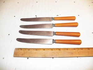 Set Vintage di 4 Coltelli da Cena Butterscotch Manici Bachelite con Lame Inox - Foto 1 di 4