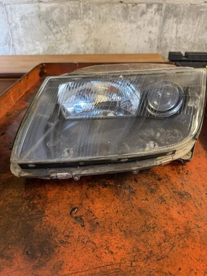 Faro delantero lado del conductor Nissan 300zx Z32 1990-1996 OEM de fábrica Foto 1 de 4