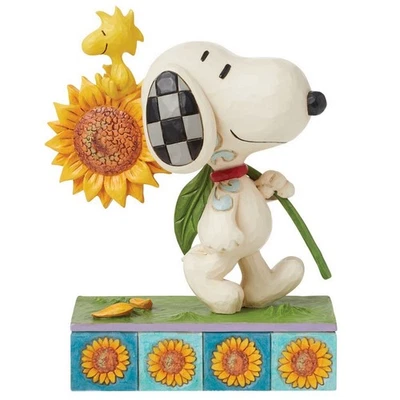 Enesco Jim Shore Peanuts Snoopy Figur (Woodstock mit Sonnenblume) - Bild 1 von 4