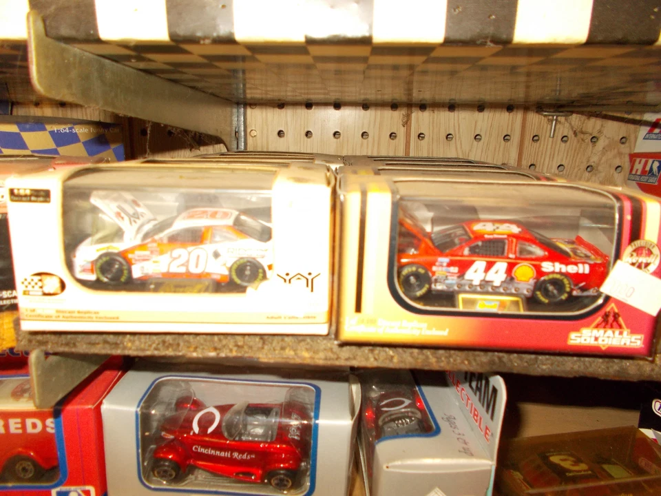 2 TONY STEWART CARS HABITAT & SMALL SOLDIERS CARS IN HARD ACRYLIC DISPLAY CASE - Image 1 of 1