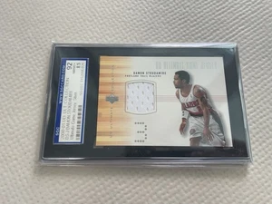DAMON STOUDAMIRE 2000-21 ULTIMATE COLLECTION GAME JERSEY SILVER SGC 8.5 - Picture 1 of 1